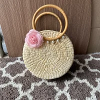 Round Rattan Handbag with Wooden Handles & Pink Rose Decor